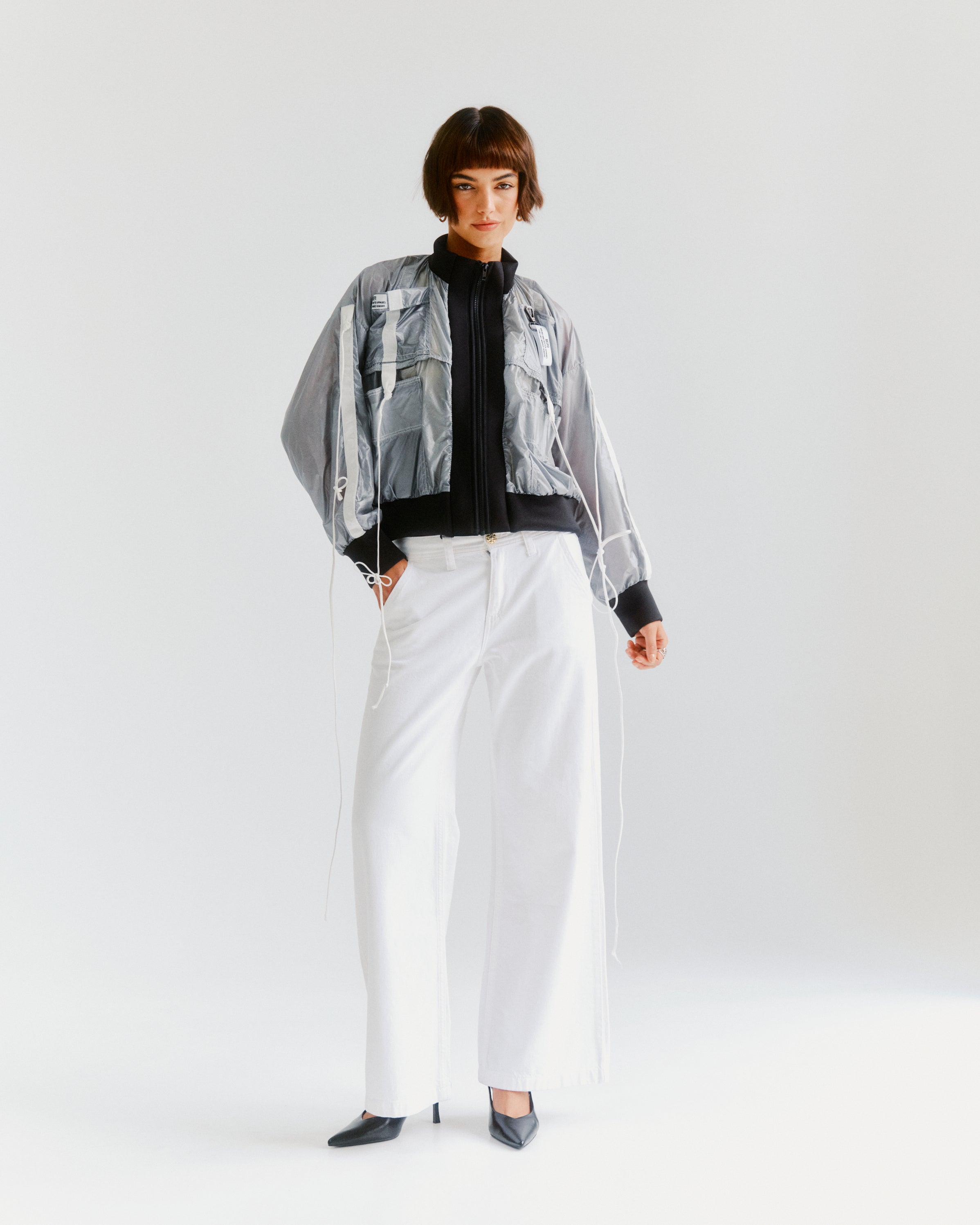 silver parachute bomber