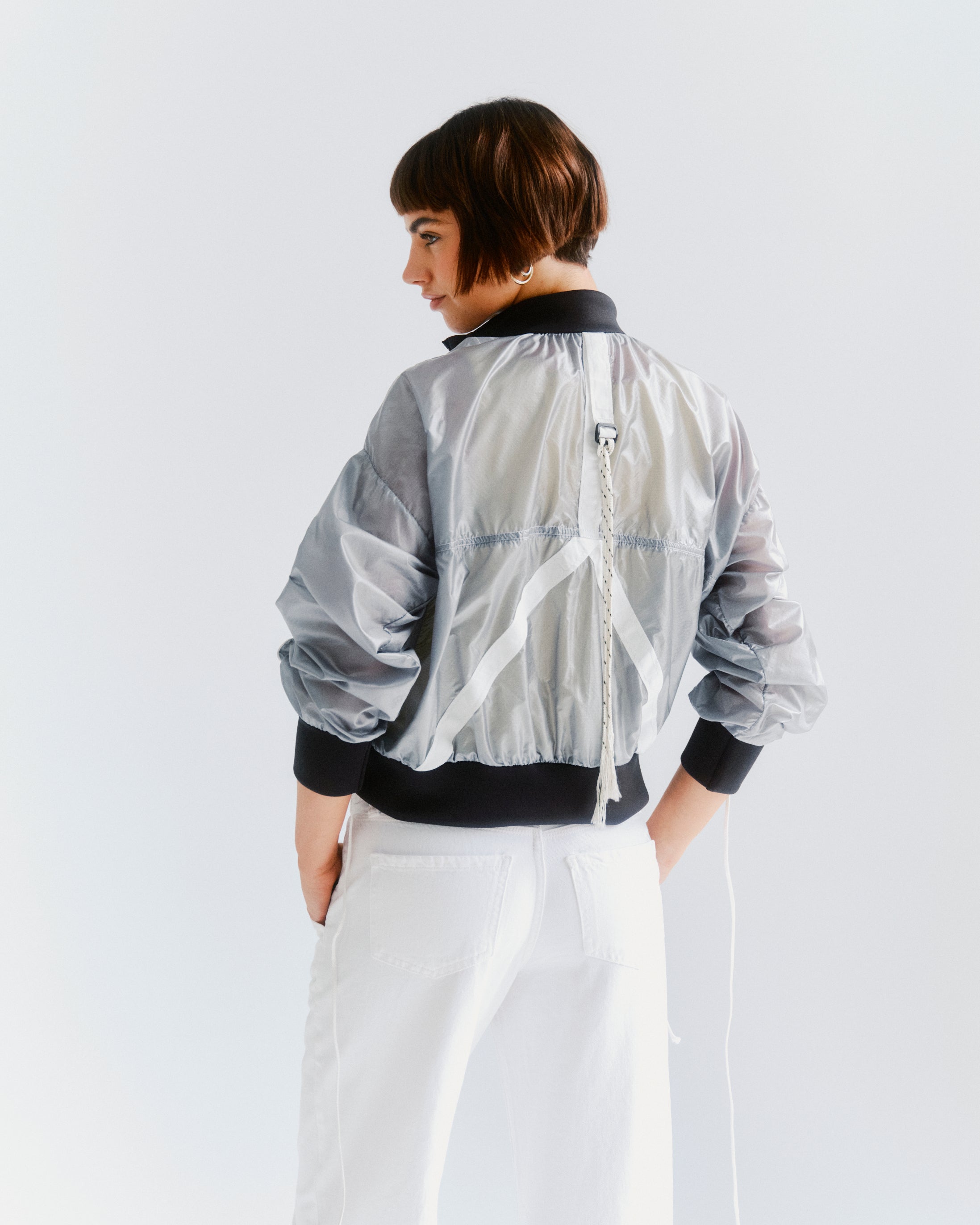 silver parachute bomber